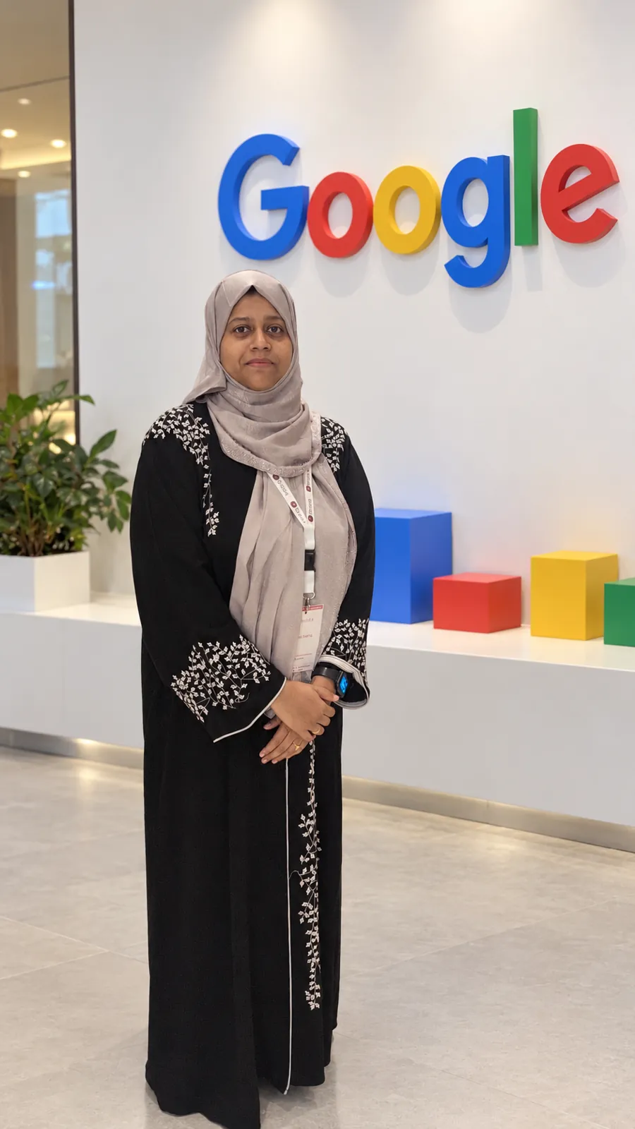 Salma Fairis in front of a Google wall