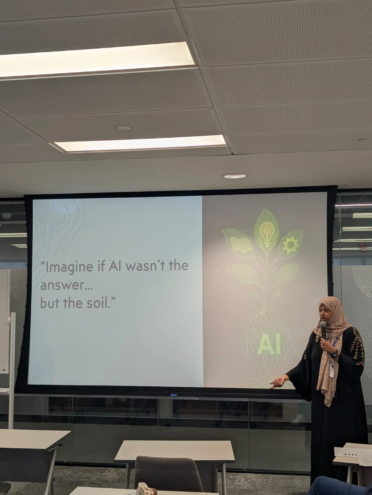 Salma speaking at the UOWD Teacher Conference